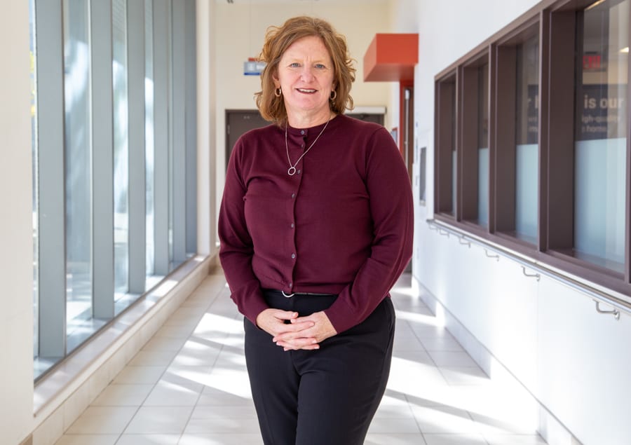 Heather Paterson stands in a quiet hallway of the hospital