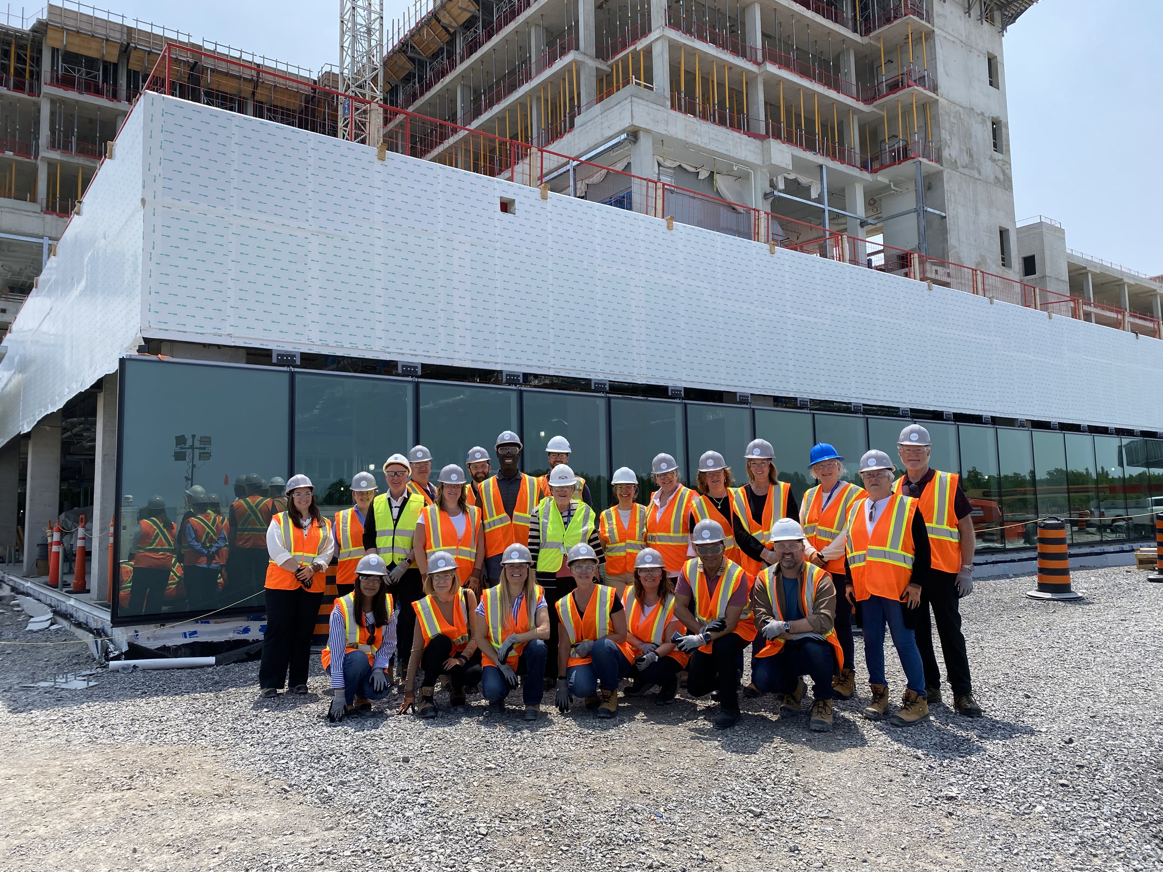 Members of the Executive Team and Board of Directors tour the construction site