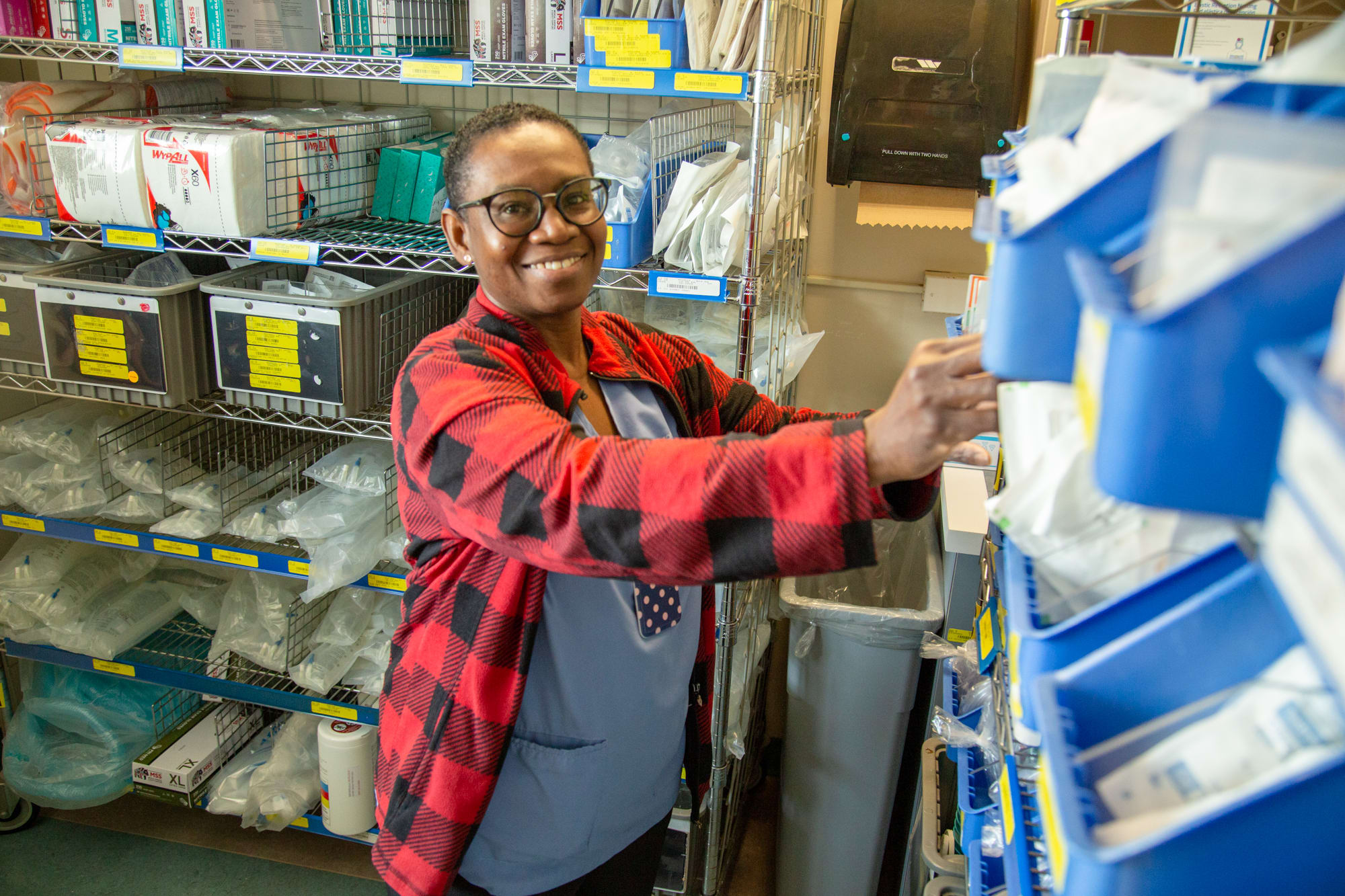 Wound Care Nurse Abi Osisanwo looks for supplies at the Welland Hospital. 